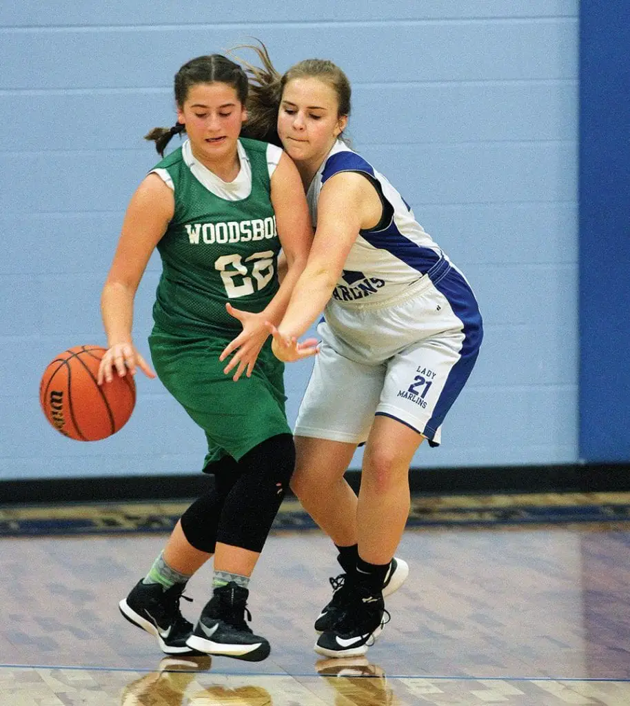Port Aransas eighth-grader Taylor Alcorn plays tight defense against Woodsboro. The teams clashed on Thursday, Feb. 1. Photo by Michelle Parker