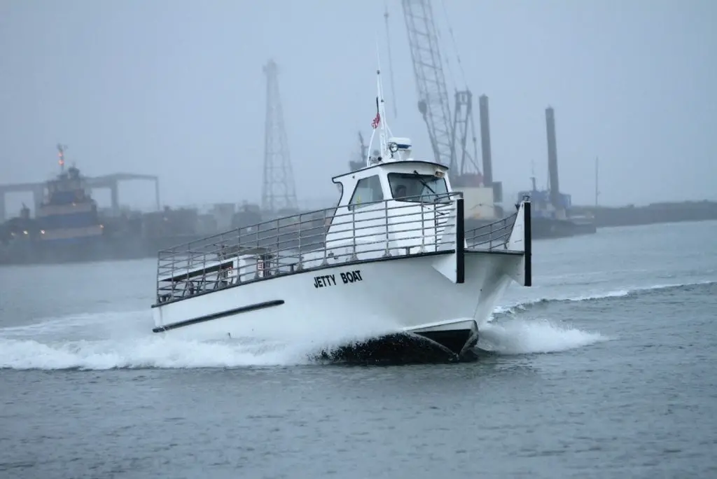 The Jetty Boat returns to Fisherman’s Wharf on Tuesday, Feb. 26, after visiting the north jetty on San Jose Island. Staff photo by Dan Parker