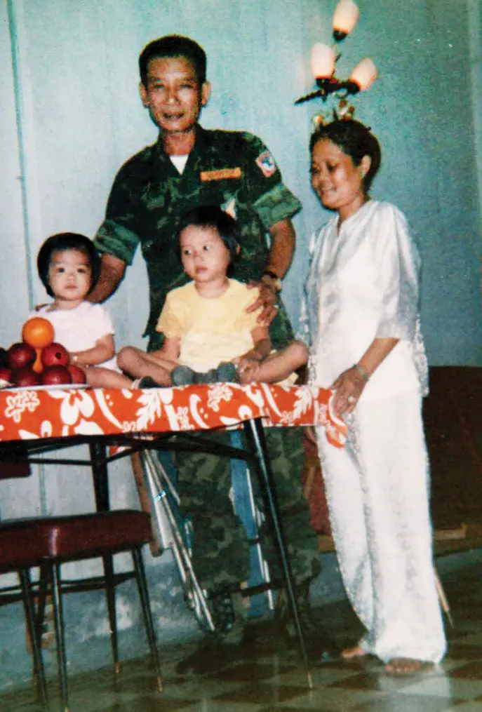 Today, Loan Herndon is a Mustang Island resident. A little more than 45 years ago, she was a little girl living in Vietnam. In this photo, 4-year-old Loan, seated at right on the table, poses for a photo with her grandparents, Dinh and Ho Nguyen, and her cousin, Young Nguyen, on Young’s first birthday on a day in the early 1970s in Vietnam. Ho was a lieutenant colonel in the South Vietnamese army. Within a couple of years after this photo was taken, Loan and her mother were living in the United States. Courtesy photo