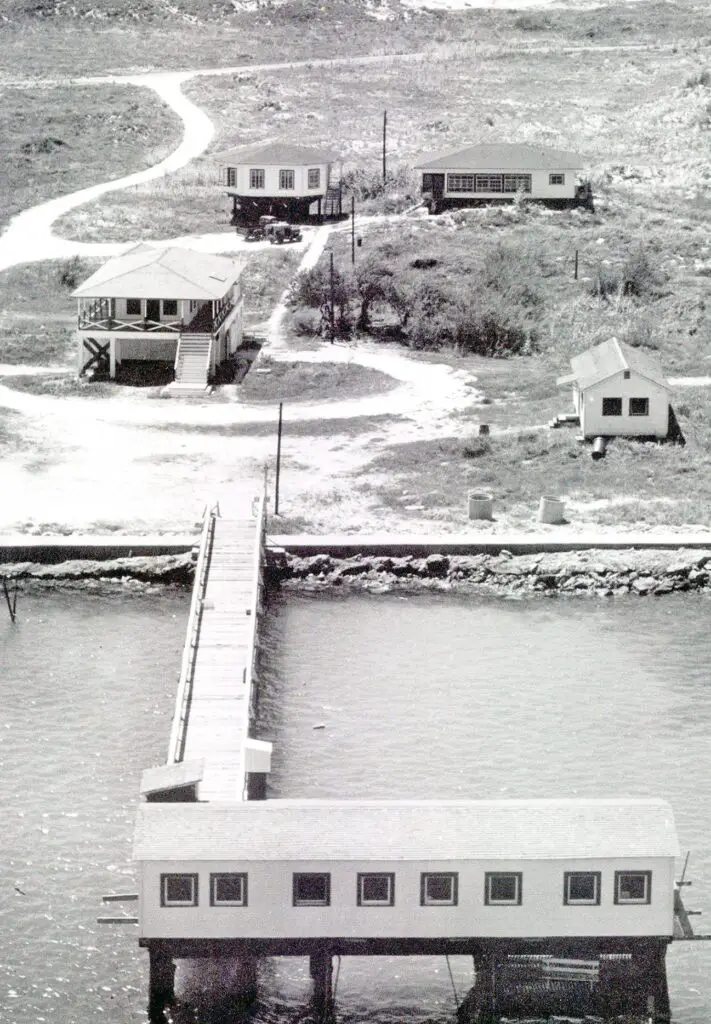A panel will discuss the development of The University of Texas Marine Science Institute as it celebrates more than 75 years in existence this year. In the photo above circa 1950, the original pier is in the foreground. Other buildings in the photo are dormitories and laboratories. Photo courtesy of UTMSI